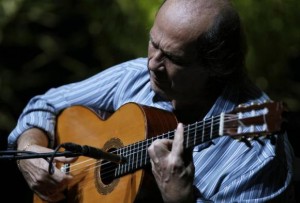 Spanish flamenco guitarist de Lucia plays a guitar during a rehearsal of closing concert of the Biennial of Flamenco in the Andalusian capital of Seville